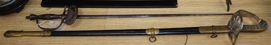 A late 18th century self protection cut steel court sword and an RAF George VI replica dress sword with associated scabbard